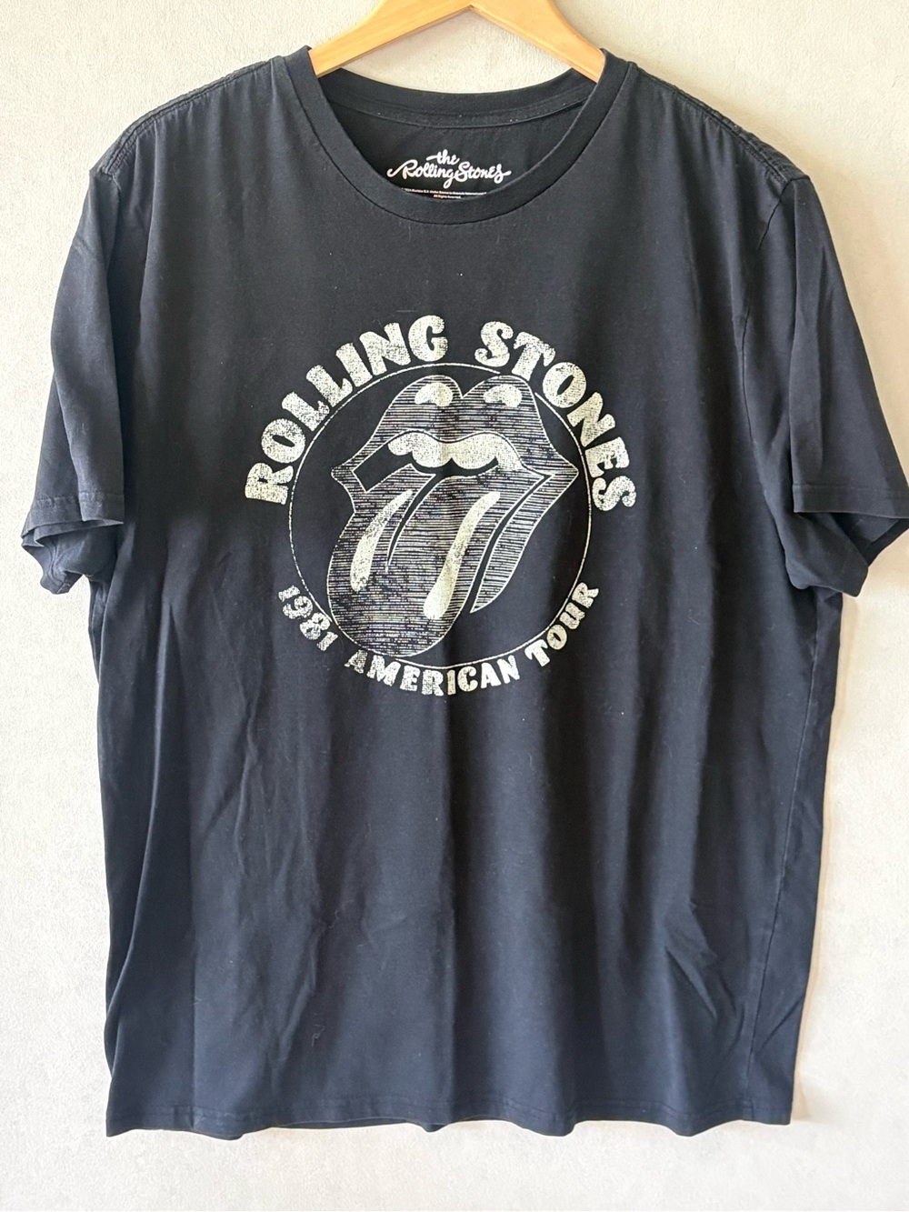 the Rolling Stones Black Graphic Tour Tee with Distressed Logo